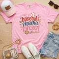Baseball Mama Energy Comfort Colors blossom pink baseball mom shirt styled as flat lay with trucker hat, sunglasses, denim shorts, and sneakers