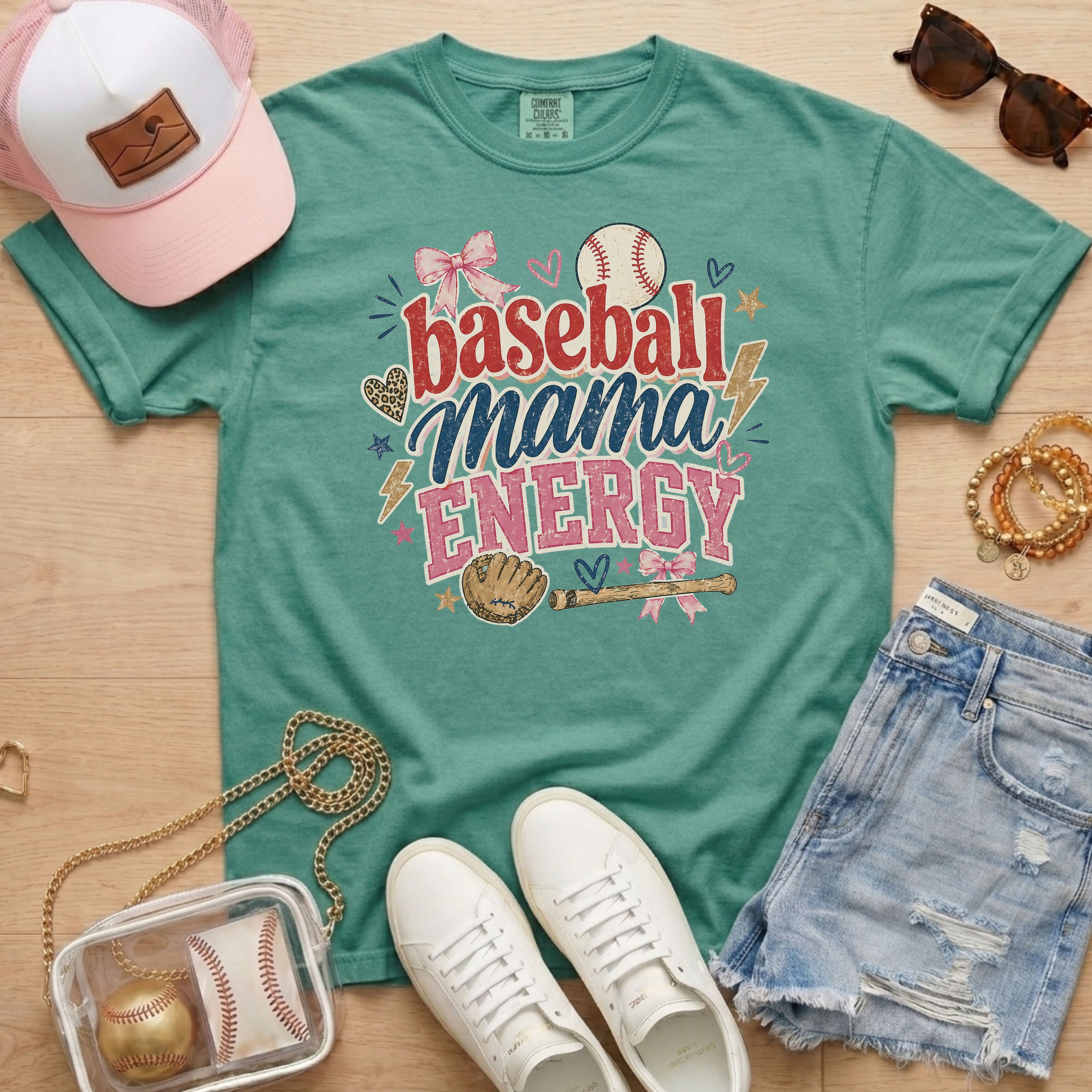 Baseball Mama Energy Comfort Colors seafoam baseball mom shirt styled as lifestyle flat lay with hat, sunglasses, and denim shorts