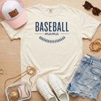 Ivory Comfort Colors 1717 Baseball Mama tee with navy blue text and baseball stitches for a classic sports mom look