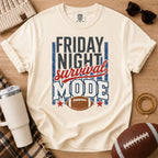 Ivory football mom shirt with Friday Night Survival Mode graphic and football game day styling.