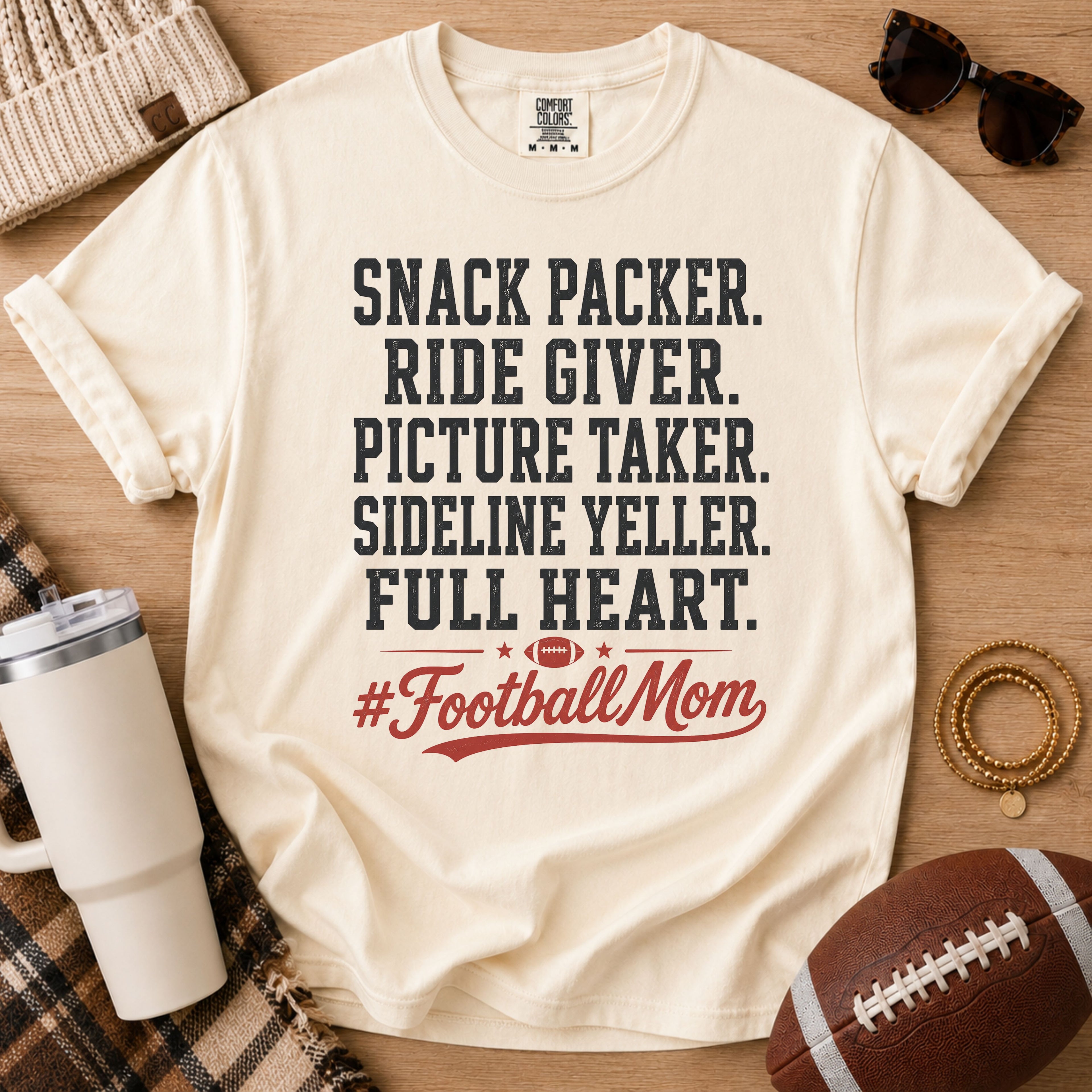 Ivory Comfort Colors football mom shirt with black and red Full Heart design for football season.