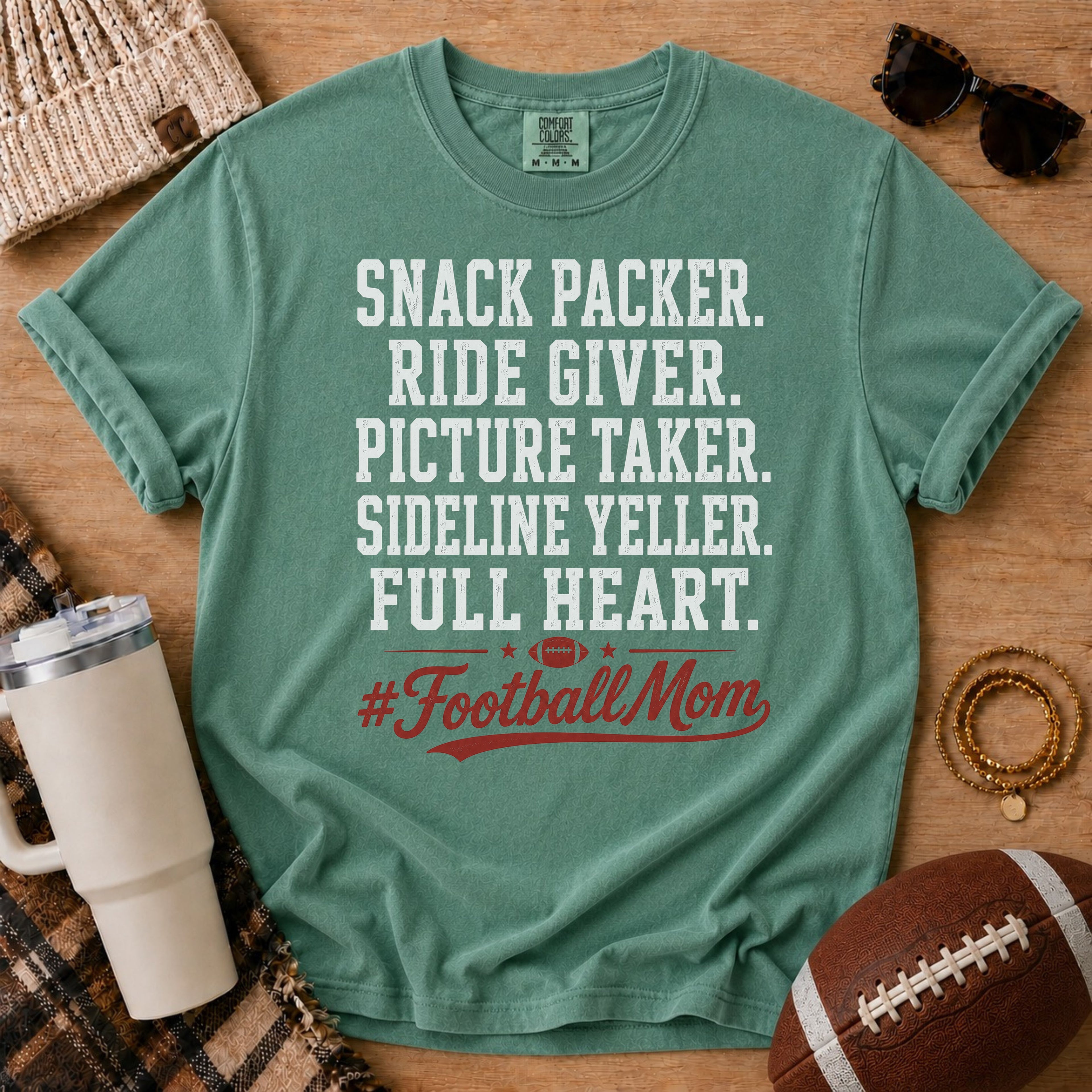 Light Green Comfort Colors football mom shirt with #FootballMom design for sideline moms.