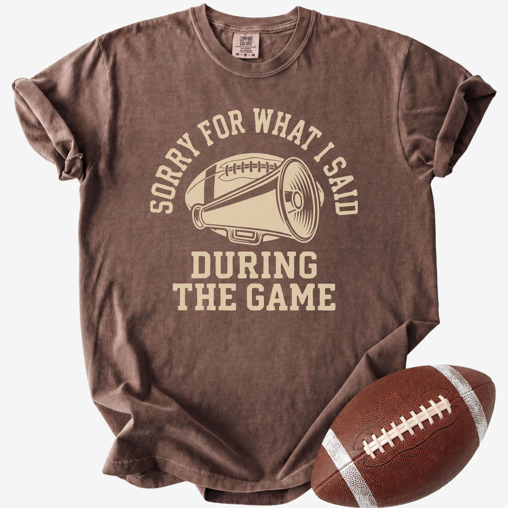 Espresso Comfort Colors football mom shirt with Sorry For What I Said During The Game design and football prop.