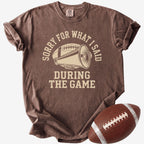 Espresso Comfort Colors football mom shirt with Sorry For What I Said During The Game design and football prop.