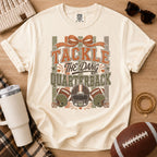 Ivory Comfort Colors football mom shirt with vintage Tackle The Dang Quarterback design and football graphics.