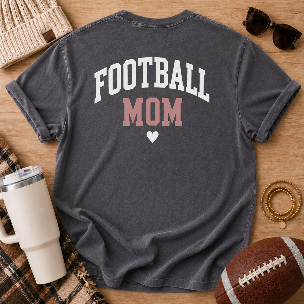 FOOTBALL MOM graphic shirt in charcoal gray, Comfort Colors Pepper, shown in a styled flat lay from the back.