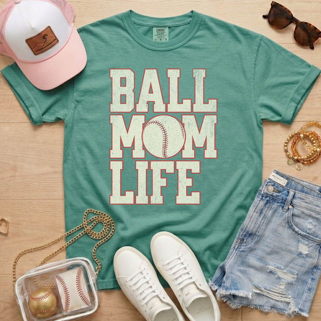 green baseball mom life shirt with distressed baseball graphic styled for casual game day outfit