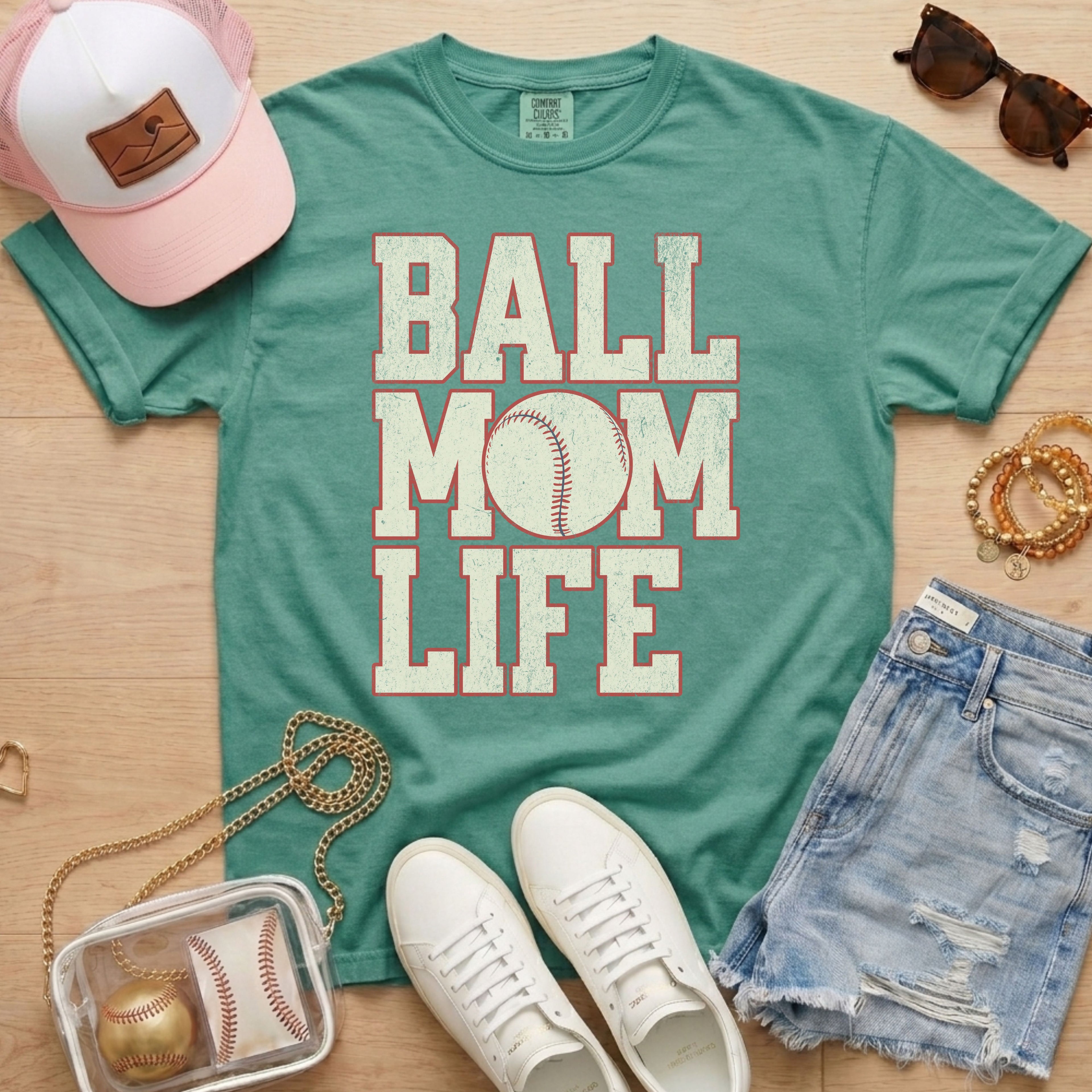 green baseball mom life shirt with distressed baseball graphic styled for casual game day outfit
