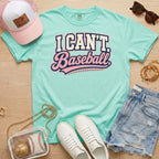 I CAN'T. Baseball. baseball mom Comfort Colors chalky mint tee in a sporty flat lay with pink hat, sneakers, denim shorts, and baseball bag.