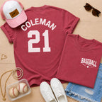 Red t-shirt with 'COLEMAN 21' and 'BASEBALL Mom' text, pink cap, white sneakers, and baseballs on a wooden surface.