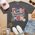 Proud baseball mom Comfort Colors pepper graphite game day tee flat lay with hat and accessories