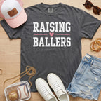 Pepper Raising Ballers T-Shirt styled with baseball mom sideline outfit