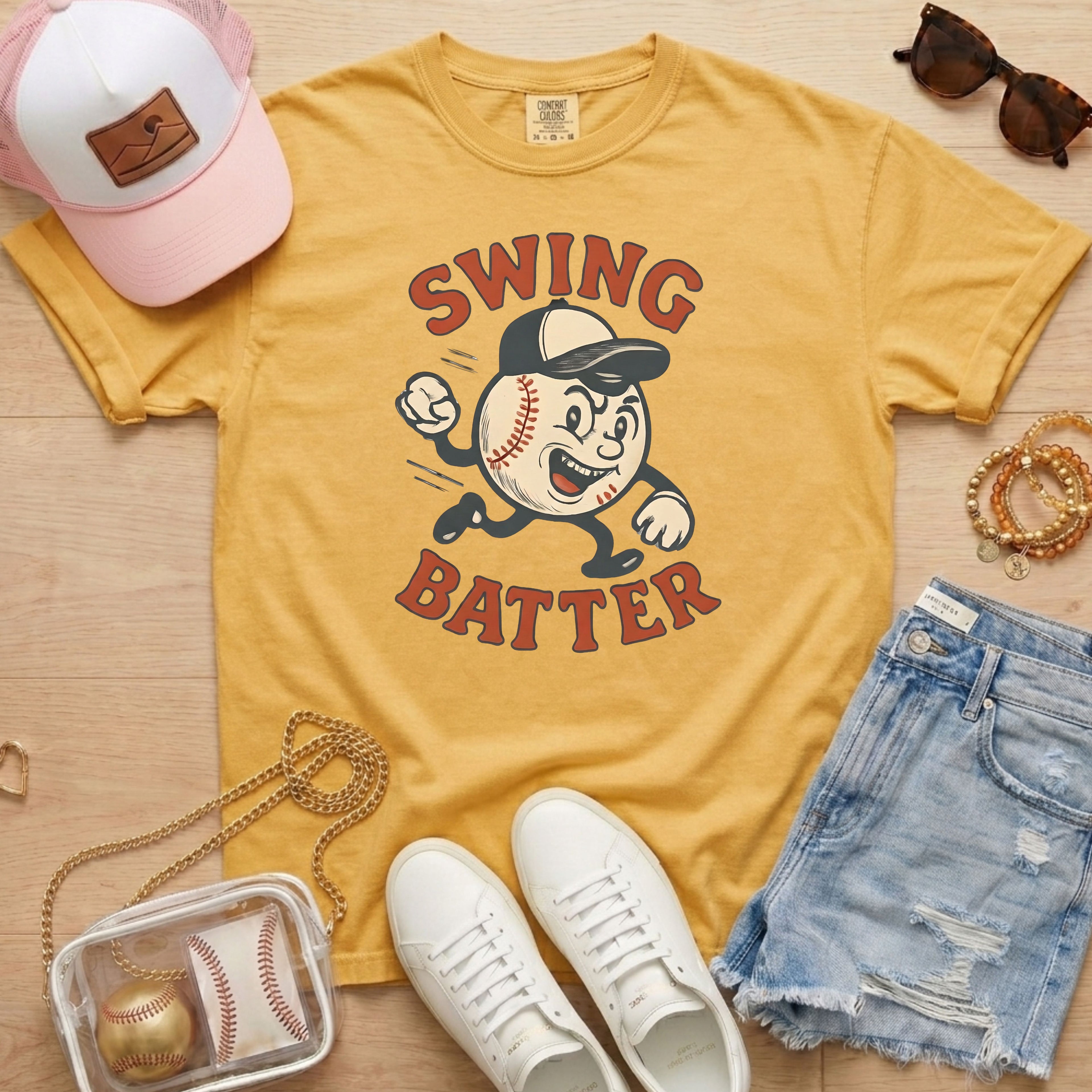 Mustard yellow vintage style baseball shirt with a running baseball mascot character