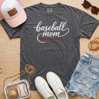 Script Baseball Mom design with red stitching on pepper grey Comfort Colors 1717 shirt for game day sports moms