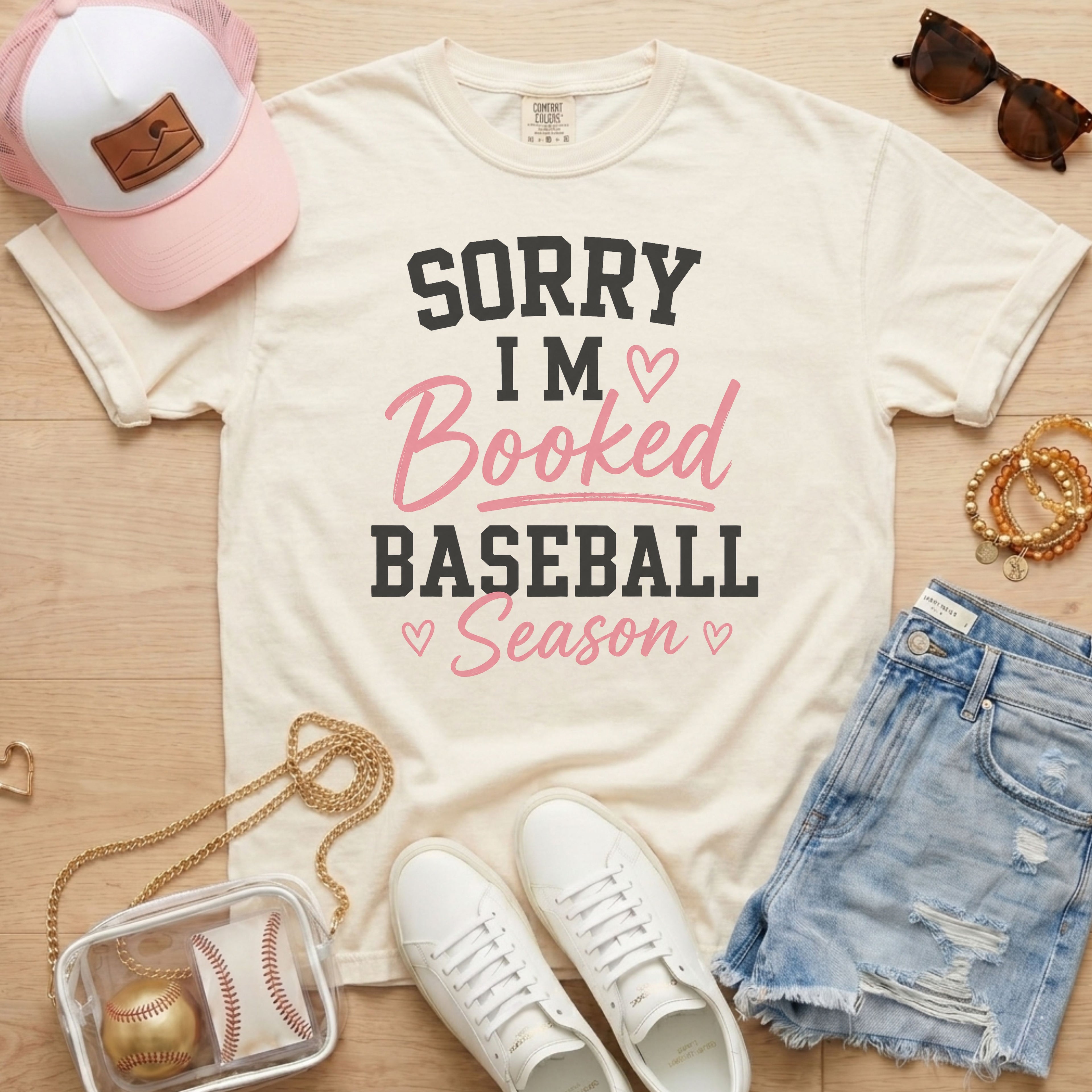 Ivory Sorry I’m Booked Baseball Season T-Shirt styled for baseball mom game days