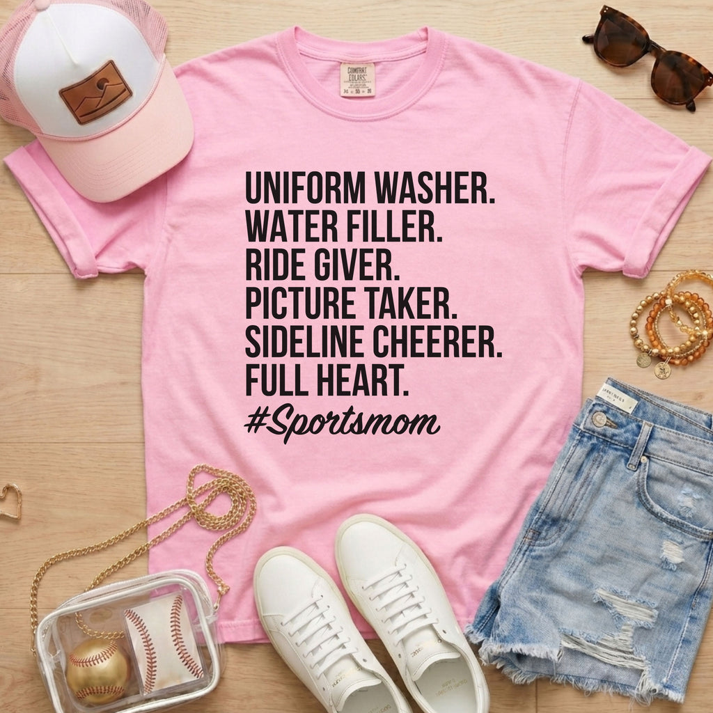 light pink sports mom shirt with bold lettering game day outfit for baseball moms