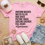 light pink sports mom shirt with bold lettering game day outfit for baseball moms
