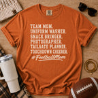Super Football Mom football mom Comfort Colors tee in Yam orange, styled with a football and tumbler