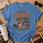 Blue Jean football mom shirt with tired football mom graphic for football season.