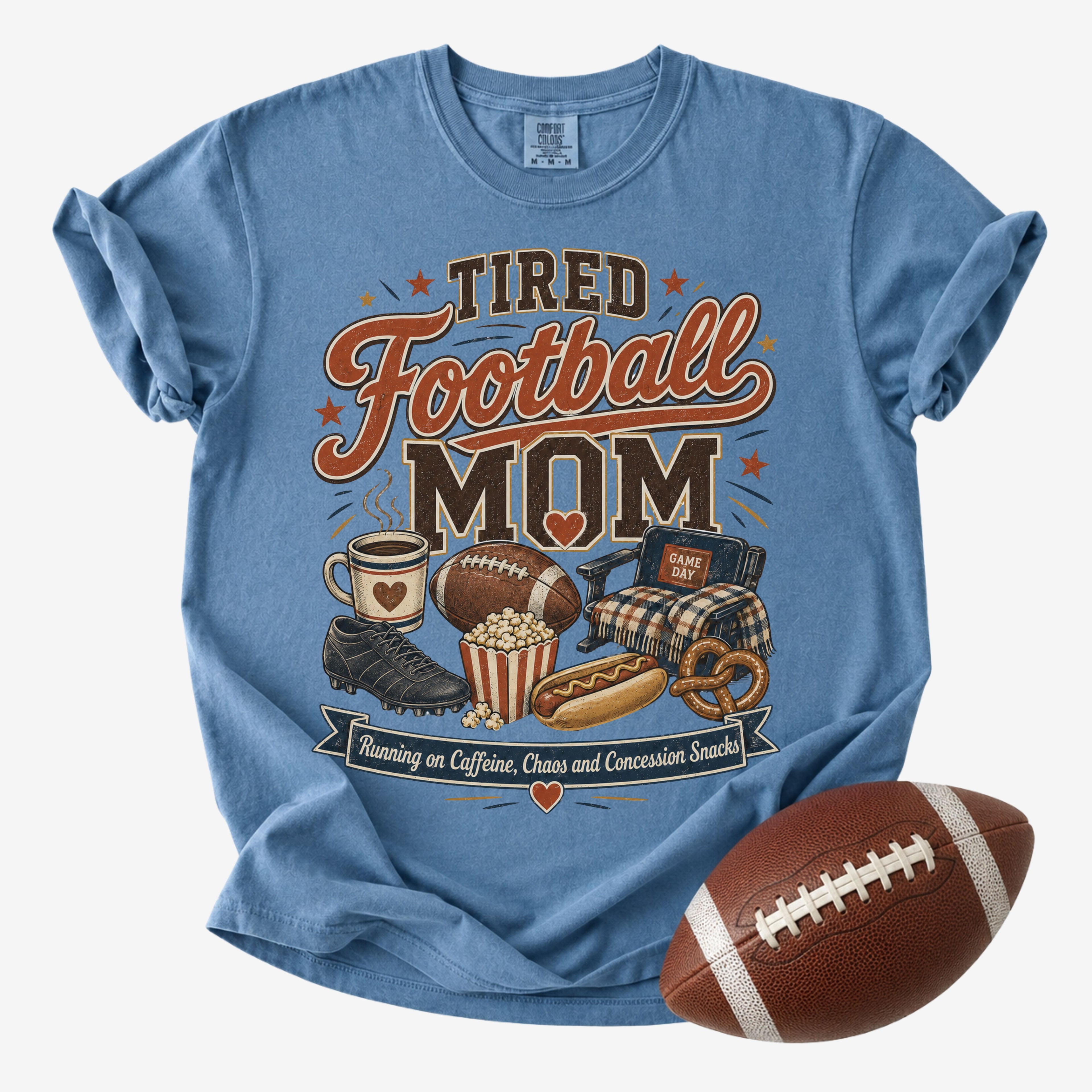 Blue Jean Comfort Colors football mom shirt with tired football mom design for game day.