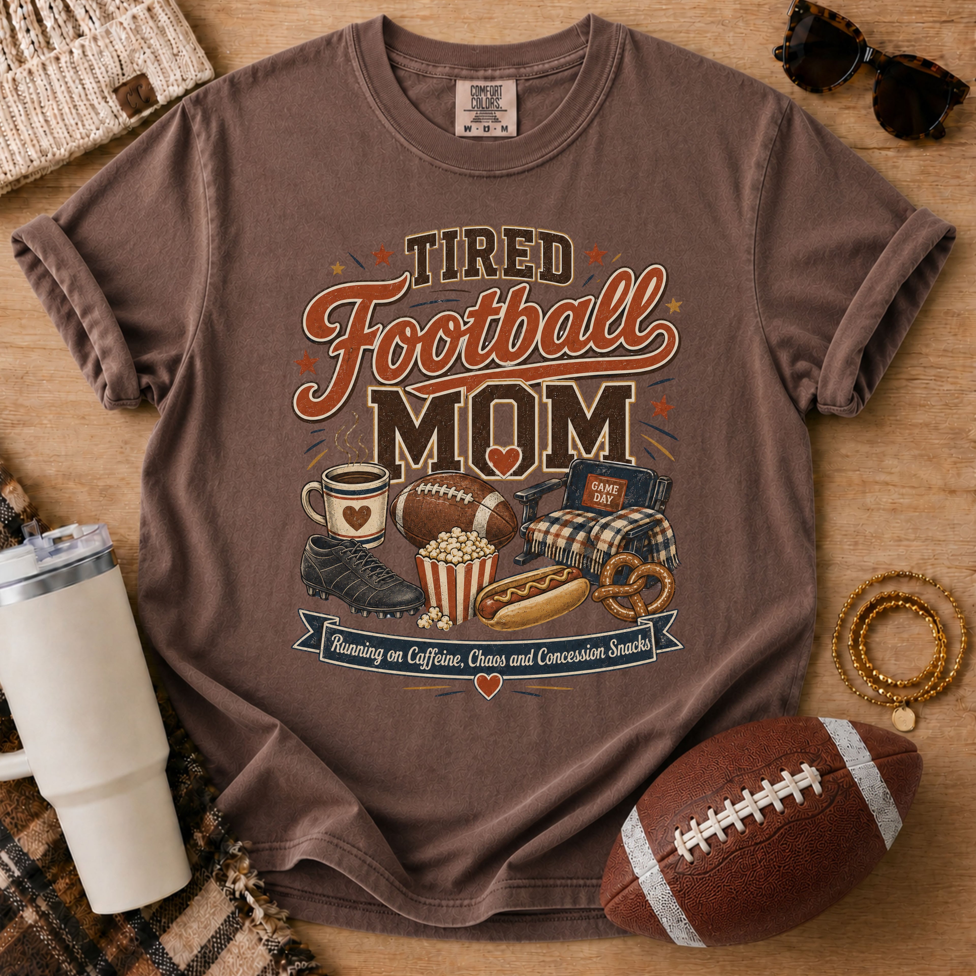 Espresso Comfort Colors football mom shirt with cozy game day graphic.