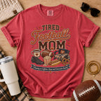 Red football mom shirt with tired football mom concession snacks design.