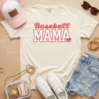 vory Baseball Mama shirt with red block lettering styled with denim shorts and white sneakers